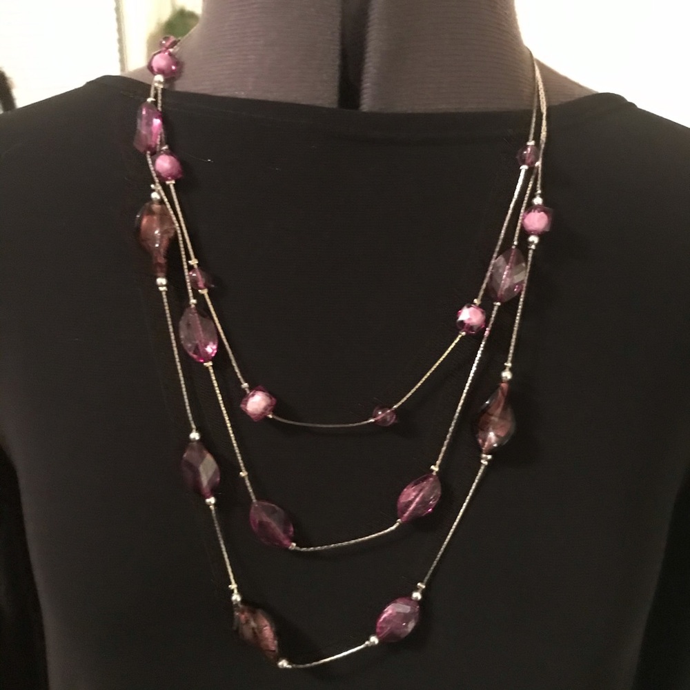 Three string purple stones necklace.